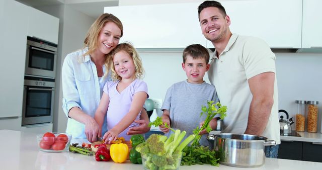 Family Cooking Together in Modern Kitchen - Download Free Stock Images Pikwizard.com