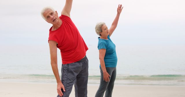Seniors Practicing Yoga Stretches on Beach - Download Free Stock Images Pikwizard.com