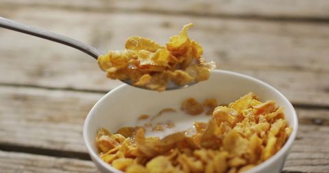 Crispy Cornflakes in Bowl with Milk for Delicious Breakfast - Download Free Stock Images Pikwizard.com