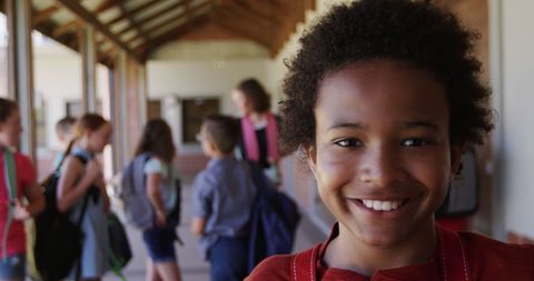 Smiling African American Girl in School Corridor - Download Free Stock Images Pikwizard.com