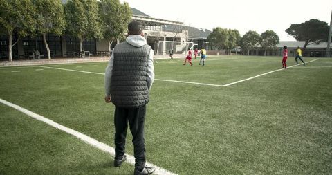Soccer Coach Observing Young Athletes During Practice - Download Free Stock Images Pikwizard.com
