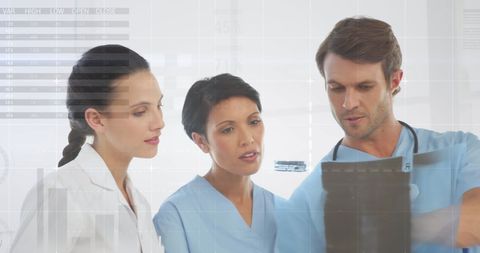 Medical Team Analyzing Diagnostic Data Visually