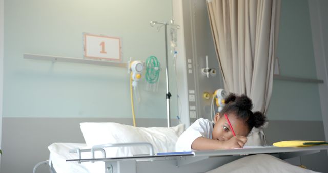 Young African American Child Recovering in Hospital Bed - Download Free Stock Images Pikwizard.com