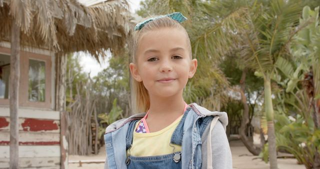 Smiling Girl Outdoors in Tropical Village - Download Free Stock Images Pikwizard.com