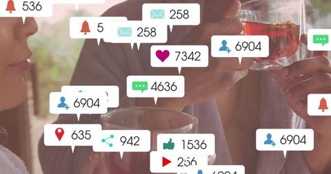 Couple clinking glasses in cafe with social media notifications showing digital engagement