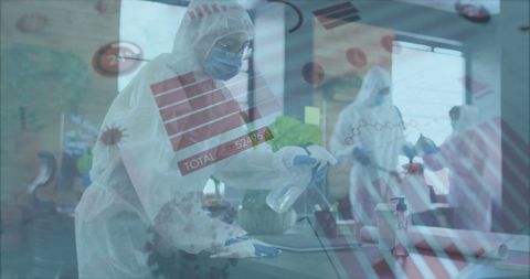 Disinfecting workspaces in modern office with safety protocols