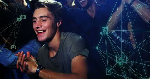 Happy Man Enjoying a Concert with Digital Connections Overlay