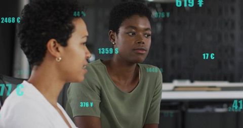 Focused Businesswoman Analyzing Digital Data in Modern Office Setting