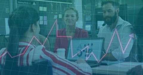 Team Analyzing Financial Growth with Digital Interface