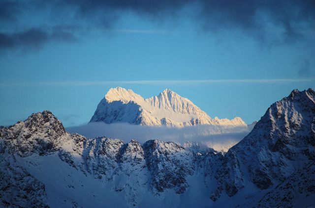 Snow-capped Mountain Peaks Against Clear Sky at Dawn - Download Free Stock Photos Pikwizard.com