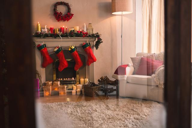Perfect for promoting holiday home decor ideas, this scene can be used in Christmas advertisements, holiday greeting cards, and festive social media posts. It showcases a cozy living room with stockings and presents, evoking a warm and welcoming holiday atmosphere.