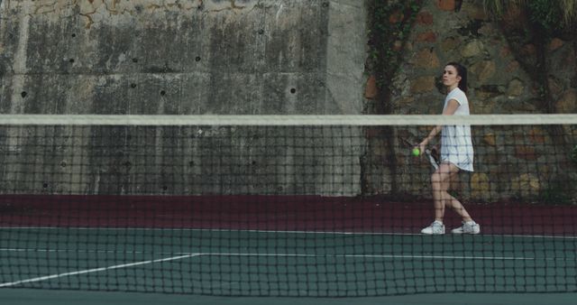 Woman Practicing Tennis on Outdoor Court - Download Free Stock Images Pikwizard.com