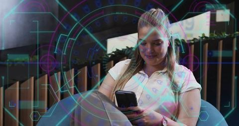 Professional Woman Exploring Digital Technology in Modern Workspace