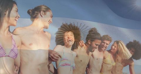 Group of Friends Enjoying Beach Day Under Sunny Skies