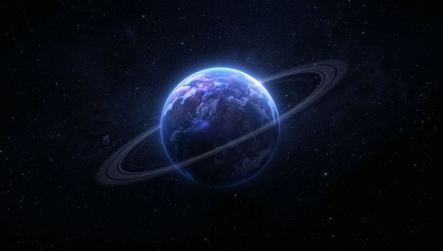 Glowing blue ringed planet showing limb brightening amid nebula and starfield, cinematic scene