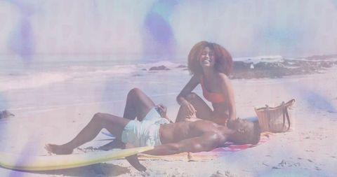 Joyful Couple Enjoying Cozy Day at Tropical Beachside Destination