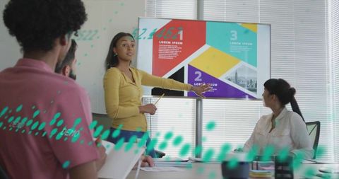 Professional diverse team strategizing in modern conference room