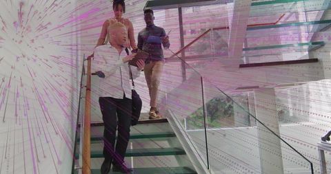 Professionals Stepping Down Glass Office Stairs in Business Attire