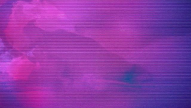 Surreal glitching mountain silhouette at vibrant lakeside