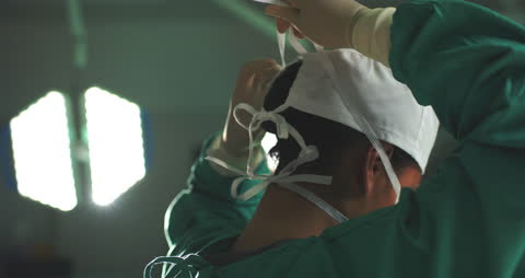 Surgeon Preparing for Surgery in Operating Room