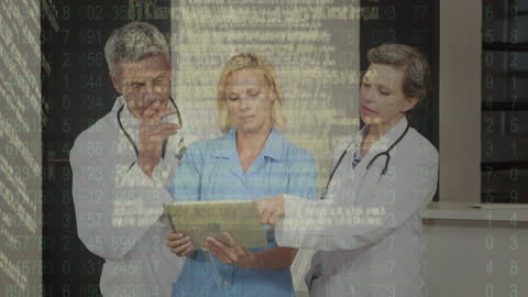 Doctors Reviewing Data with Digital Interface Overlay