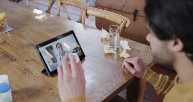 Man Participating in Virtual Consultation Technologies at Home - Download Free Stock Images Pikwizard.com