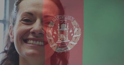 Smiling woman with afghanistan flag overlay symbolizing diversity and patriotism