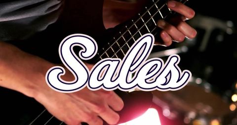 Music and Sales Concept Overlaid on Guitarist