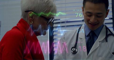 Doctor and patient analyzing digital health data in modern clinic