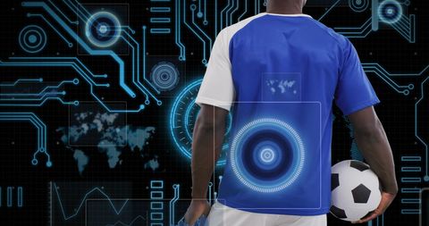 Soccer Player Analyzing Futuristic Sports Technology Interface