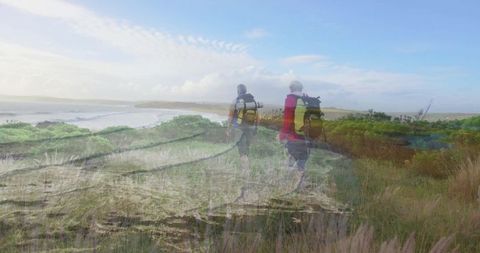 Mature Hikers Exploring Coastal Trail Surrounded by Nature