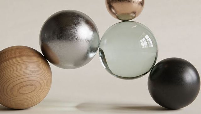 Minimalist floating spheres showing wood metal glass black bronze textures