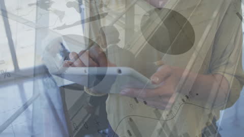 Business Professionals Analyzing Data on Digital Tablet