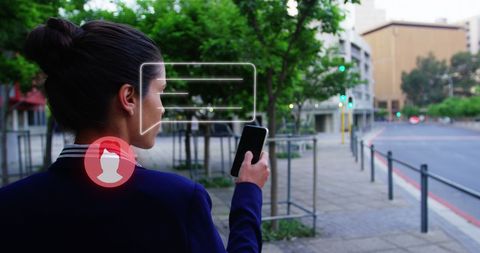 Businesswoman Engaging with Virtual Interfaces Outdoors