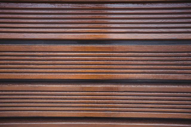 Wooden panels with striped pattern background, full frame