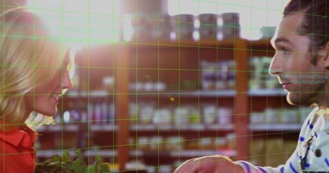 Friends shopping for organic produce in rustic grocery store