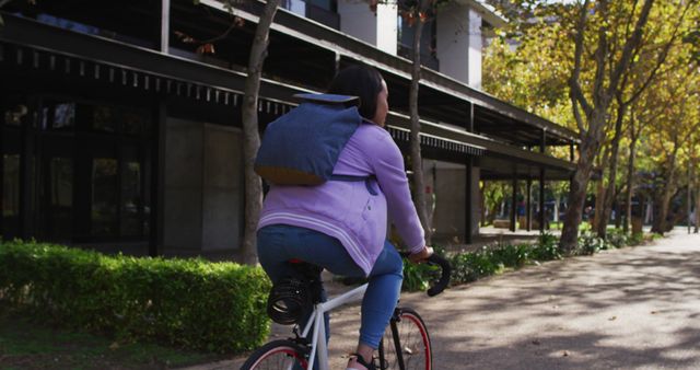 Urban Cyclist Riding in Autumn Park - Download Free Stock Images Pikwizard.com