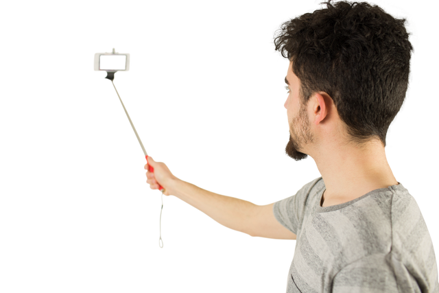 Young Man Taking a Selfie in T-Shirt Using Transparent Background - Download Free Stock Videos Pikwizard.com