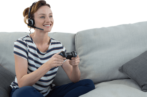 Smiling Woman Wearing Headset Playing Video Games on Sofa Transparent Background - Download Free Stock Videos Pikwizard.com