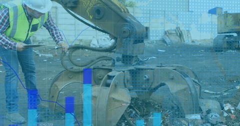 Worker at Junkyard Analyzing Data with Industrial Machines - Download Free Stock Images Pikwizard.com