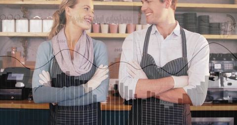 Smiling cafe baristas collaborating behind counter with business analytics overlay