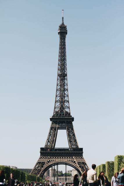 Tourists Enjoying Eiffel Tower on a Clear Day - Download Free Stock Photos Pikwizard.com