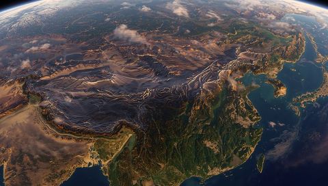 Stunning view of himalayan peaks and coastal plains from orbit