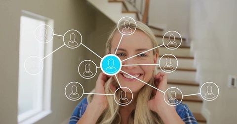 Smiling Woman in Home with Modern Connectivity Icons Overlay