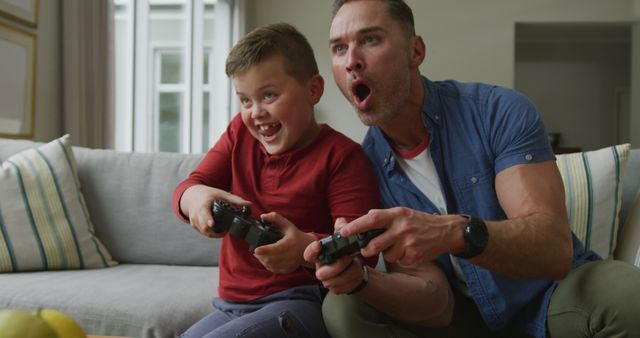 Father and Son Enjoying a Video Game Together - Download Free Stock Images Pikwizard.com