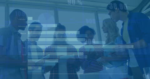 Diverse Team Analyzing Business Statistics in Modern Office