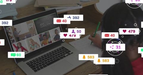 Girl taking notes in virtual classroom with live reaction badges and remote learning