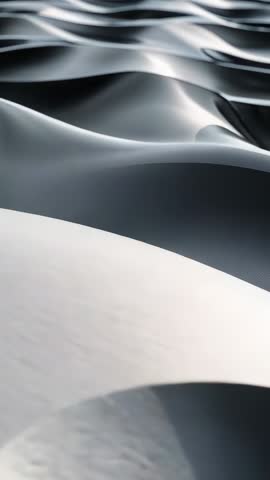 Vertical abstract video of monochrome fluid sculptures shifting in smooth digital waves