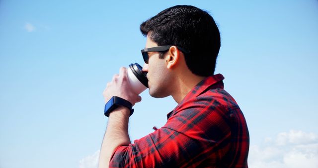 Man Enjoying Coffee in Sunny Day with Blue Sky Background - Download Free Stock Images Pikwizard.com