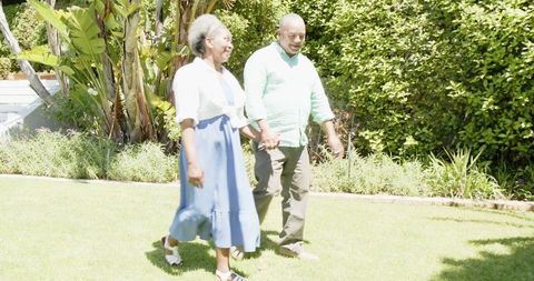 Senior Couple Invites Romance in Lush Garden Engagement